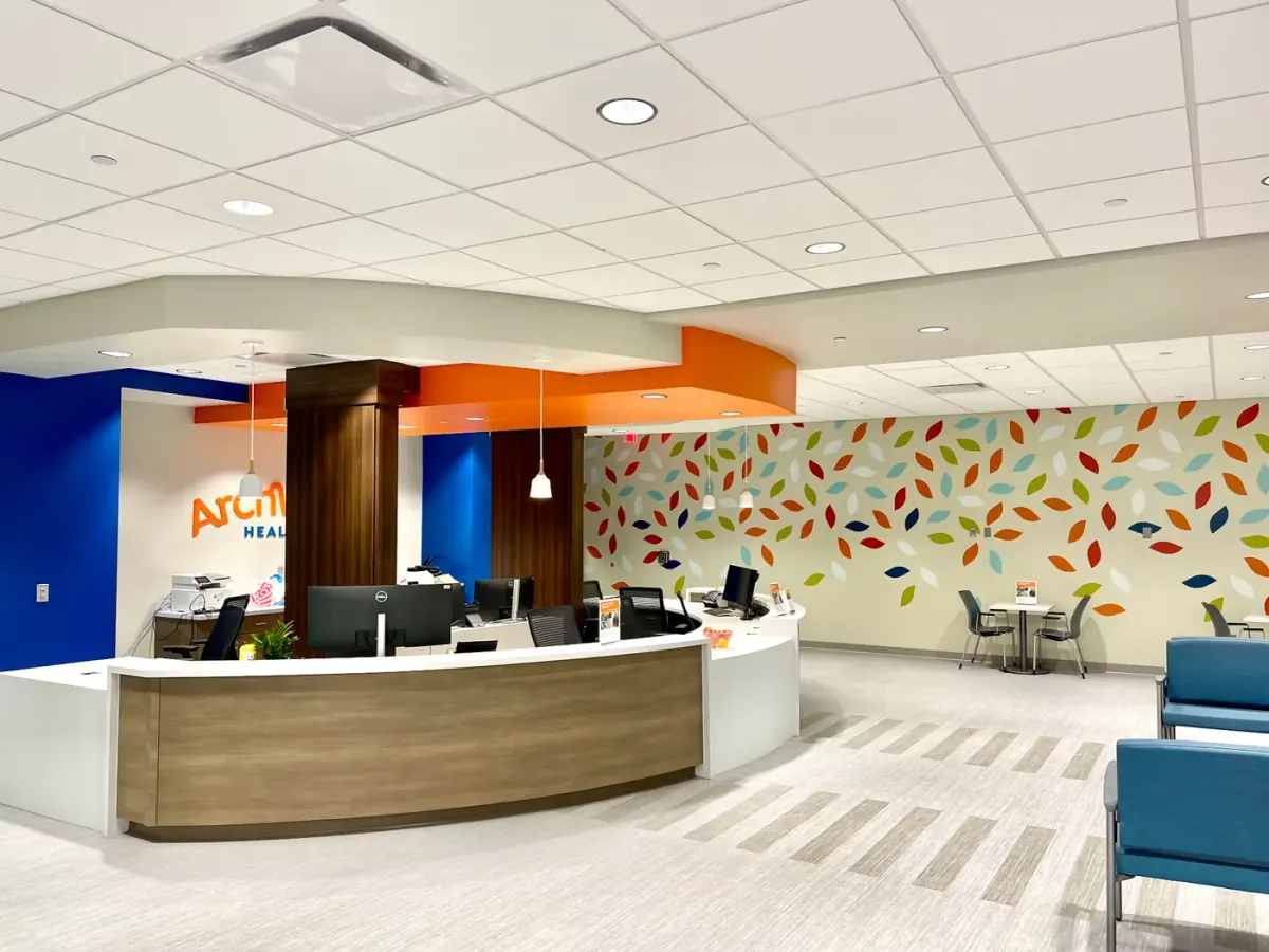 Clean medical office reception desk and waiting area